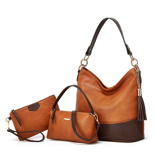 3-piece brown and tan leather handbag set including hobo bag with tassel, mini structured bag, and wristlet clutch